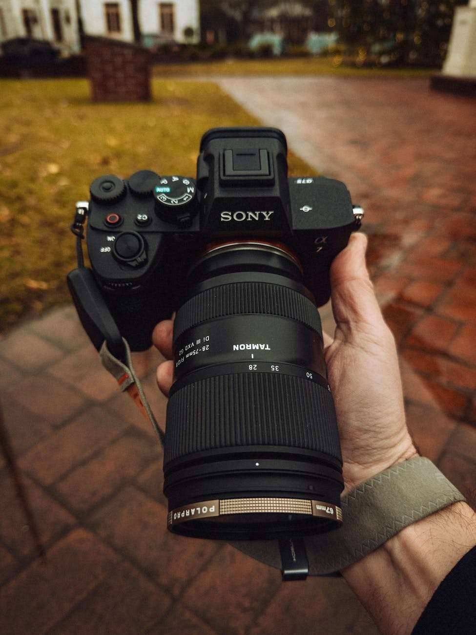 professional dslr camera with telephoto lens outdoors